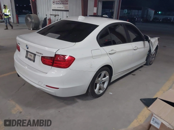2014 BMW 3 Series 328i xDrive with VIN WBA3B5G53ENS08113, listed as a IAAI auction lot 41168947 with Not Provided miles and . Bid and sale history available at DreamBid. Image 4.