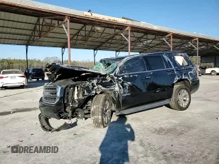 2019 GMC Yukon SLE with VIN 1GKS1AKC6KR302642, listed as a Copart auction lot 41510715 with 97,906 mi miles and Salvage Title. Bid and sale history available at carsss.com. Image 12.