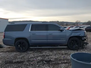 2015 GMC Yukon XL Denali with VIN 1GKS2JKJ3FR616122, listed as a IAAI auction lot 41415642 with Not Provided miles and . Bid and sale history available at DreamBid. Image 14.