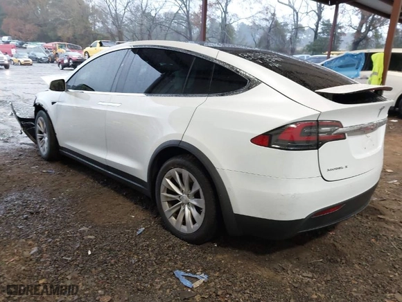 2018 Tesla Model X 75D with VIN 5YJXCBE24JF138297, listed as a IAAI auction lot 41058224 with NaN miles. Bid and sale history available at carsss.com. Image 3.
