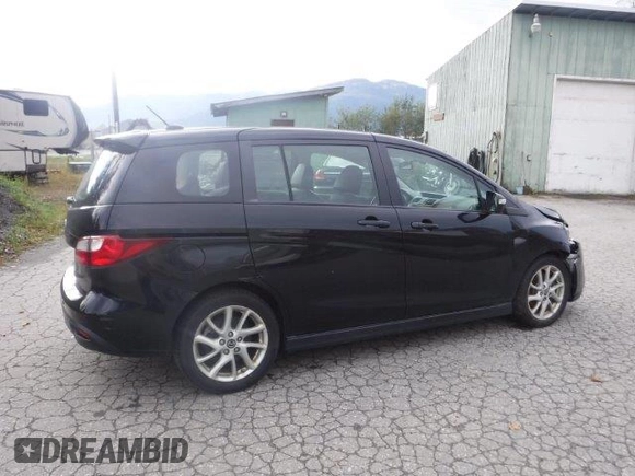 2015 Mazda Mazda5 Grand Touring with VIN JM1CW2DL4F0179518, listed as a Copart auction lot 68946694 with 97,339 mi miles and Salvage Title. Bid and sale history available at carsss.com. Image 3.