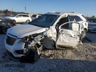 2024 Cadillac XT5 FWD Premium Luxury with VIN 1GYKNCRS7RZ740471, listed as a Copart auction lot 82275174 with 14,747 mi miles and Salvage Title. Bid and sale history available at carsss.com. Image 1.