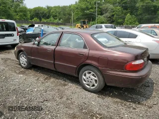 2000 Mazda 626 LX z VIN 1YVGF22C4Y5112874, wystawiony jako Copart lot #58952175 z przebiegiem 100 070 mil mil oraz Szkoda całkowita • Salvage title. Historia ofert i sprzedaży dostępna na DreamBid. Obrazek 2.