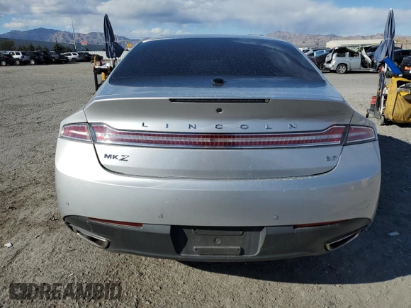 2016 Lincoln MKZ z VIN 3LN6L2GK2GR623601, wystawiony jako Copart lot #43823305 z przebiegiem 106 360 mil mil oraz Szkoda całkowita • Salvage title. Historia ofert i sprzedaży dostępna na DreamBid. Obrazek 6.