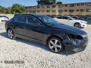 2014 Acura ILX z VIN 19VDE1F3XEE012920, wystawiony jako Copart lot #56931455 z przebiegiem 137 002 mil mil oraz Szkoda całkowita • Salvage title. Historia ofert i sprzedaży dostępna na DreamBid. Obrazek 4.
