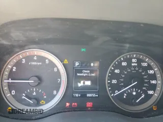 2017 Hyundai Tucson Value z VIN KM8J33A25HU285145, wystawiony jako Copart lot #53126025 z przebiegiem 89 912 mil mil oraz Szkoda całkowita • Salvage title. Historia ofert i sprzedaży dostępna na DreamBid. Obrazek 9.