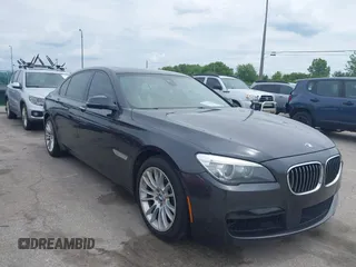 2014 BMW 7 Series ALPINA B7 xDrive with VIN WBAYF8C54ED653001, listed as a IAAI auction lot 42554011 with 133,528 mi miles and . Bid and sale history available at DreamBid. Image 1.