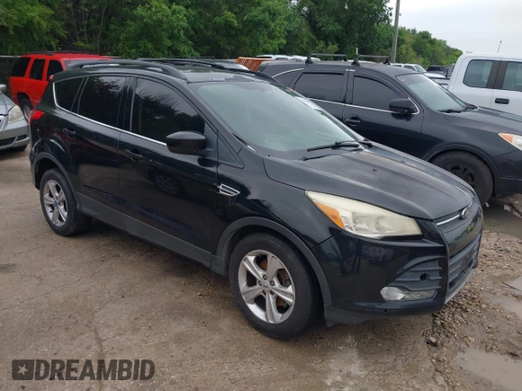 2013 Ford Escape SE with VIN 1FMCU0GX5DUB68604, listed as a IAAI auction lot 42126594 with 165,540 mi miles and . Bid and sale history available at carsss.com. Image 1.