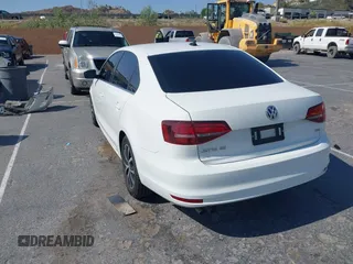 2017 Volkswagen Jetta SE with VIN 3VWDB7AJ4HM209596, listed as a IAAI auction lot 42608209 with 30,559 mi miles and . Bid and sale history available at DreamBid. Image 3.