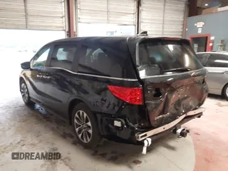2024 Honda Odyssey EX-L with VIN 5FNRL6H65RB018633, listed as a IAAI auction lot 41801512 with 22,103 mi miles and . Bid and sale history available at DreamBid. Image 3.
