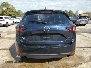 2021 Mazda CX-5 Grand Touring with VIN JM3KFBDM8M0489180, listed as a Copart auction lot 49900525 with 34,687 mi miles and Salvage Title. Bid and sale history available at carsss.com. Image 6.