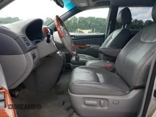 2010 Toyota Sienna XLE with VIN 5TDYK4CC5AS340124, listed as a Copart auction lot 66178854 with 99,485 mi miles and Salvage Title. Bid and sale history available at carsss.com. Image 7.