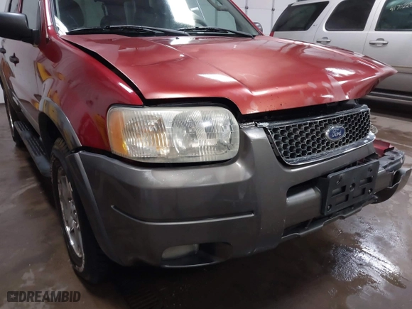 2003 Ford Escape XLT Popular 2 with VIN 1FMCU93173KA52806, listed as a IAAI auction lot 41696250 with 138,338 mi miles. Bid and sale history available at carsss.com. Image 17.