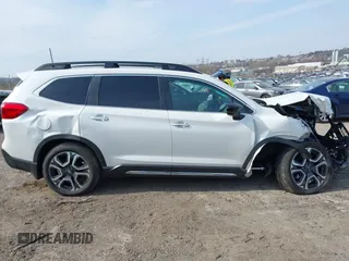2024 Subaru Ascent Touring z VIN 4S4WMAWD2R3423801, wystawiony jako IAAI lot #41711587 z przebiegiem 8 833 mil mil oraz . Historia ofert i sprzedaży dostępna na DreamBid. Obrazek 12.