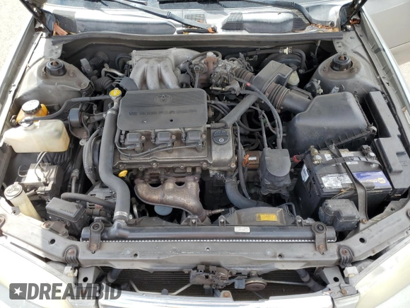 2001 Toyota Camry LE z VIN JT2BF22K310338343, wystawiony jako Copart lot #45181715 z przebiegiem 183 500 mil mil oraz Szkoda całkowita • Salvage title. Historia ofert i sprzedaży dostępna na DreamBid. Obrazek 11.