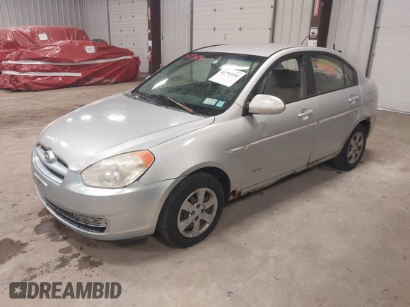2006 Hyundai Accent GLS with VIN KMHCN46C06U004764, listed as a IAAI auction lot 41793192 with 182,841 mi miles. Bid and sale history available at carsss.com. Image 2.
