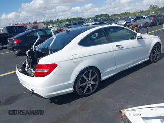 2015 Mercedes-Benz C 250 with VIN WDDGJ4HB4FG410766, listed as a IAAI auction lot 42307457 with 50,979 mi miles and . Bid and sale history available at DreamBid. Image 4.