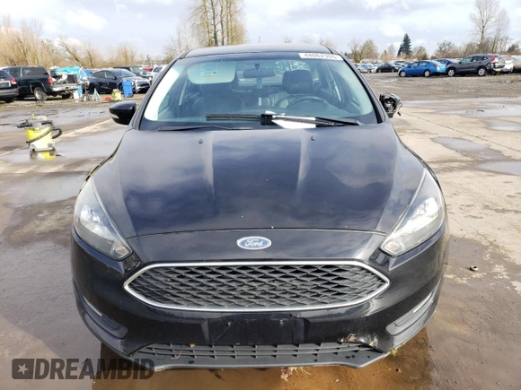 2016 Ford Focus SE with VIN 1FADP3F29GL380672, listed as a Copart auction lot 44062305 with 84,917 mi miles and Salvage title. Bid and sale history available at DreamBid. Image 5.