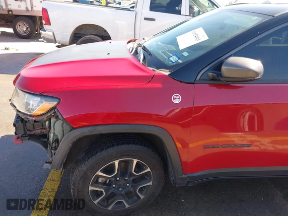 2020 Jeep Compass Trailhawk z VIN 3C4NJDDB5LT162915, wystawiony jako IAAI lot #41654603 z przebiegiem 89 316 mil mil oraz . Historia ofert i sprzedaży dostępna na DreamBid. Obrazek 18.