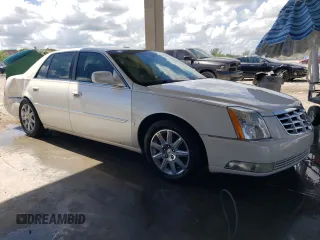 2009 Cadillac DTS 1SC z VIN 1G6KD57Y69U127768, wystawiony jako Copart lot #72415494 z przebiegiem 97 811 mil mil oraz Szkoda całkowita • Salvage title. Historia ofert i sprzedaży dostępna na DreamBid. Obrazek 4.