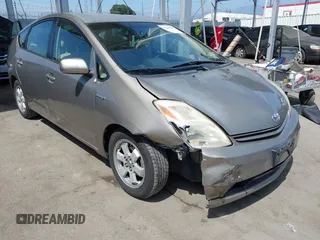 2005 Toyota Prius z VIN JTDKB20U053041607, wystawiony jako IAAI lot #42342589 z przebiegiem 233 998 mil mil oraz . Historia ofert i sprzedaży dostępna na DreamBid. Obrazek 1.