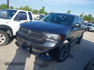 2013 Dodge Durango R/T with VIN 1C4SDHCT6DC658802, listed as a IAAI auction lot 42510985 with 67,653 mi miles and . Bid and sale history available at DreamBid. Image 2.