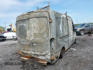2015 Ford Transit Cargo with VIN 1FTNR2CG5FKA99184, listed as a IAAI auction lot 42143175 with Not provided miles and . Bid and sale history available at DreamBid. Image 4.