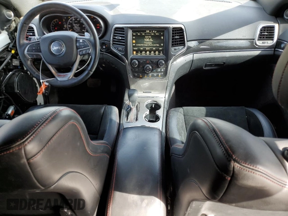 2017 Jeep Grand Cherokee Trailhawk with VIN 1C4RJFLT1HC729163, listed as a Copart auction lot 51115745 with 213,292 mi miles and Salvage title. Bid and sale history available at DreamBid. Image 8.