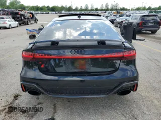 2022 Audi RS 7 z VIN WUAPCBF27NN905150, wystawiony jako Copart lot #55993395 z przebiegiem 30 948 mil mil oraz Szkody całkowita. Historia ofert i sprzedaży dostępna na DreamBid. Obrazek 6.