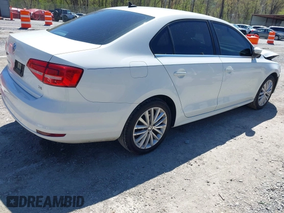2015 Volkswagen Jetta SE with VIN 3VWD07AJ8FM284756, listed as a IAAI auction lot 42038453 with 127,112 mi miles and . Bid and sale history available at DreamBid. Image 4.