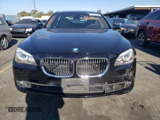2011 BMW 7 Series 750Li with VIN WBAKB8C52BCY66628, listed as a Copart auction lot 77191054 with 39,503 mi miles and Salvage Title. Bid and sale history available at carsss.com. Image 5.