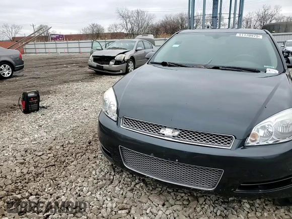 2012 Chevrolet Impala LT Retail with VIN 2G1WB5E32C1300905, listed as a Copart auction lot 51170975 with 164,345 mi miles and Salvage Title. Bid and sale history available at DreamBid. Image 11.