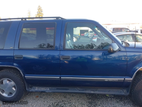 1997 Chevrolet Tahoe with VIN 1GNEK13R4VJ418974, listed as a IAAI auction lot 41560411 with 198,170 mi miles. Bid and sale history available at carsss.com. Image 13.