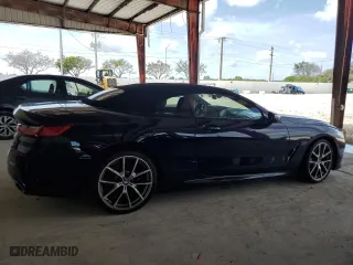 2019 BMW 8 Series M850i xDrive with VIN WBAFY4C59KBX38790, listed as a Copart auction lot 69656654 with 30,863 mi miles and Salvage Title. Bid and sale history available at carsss.com. Image 3.