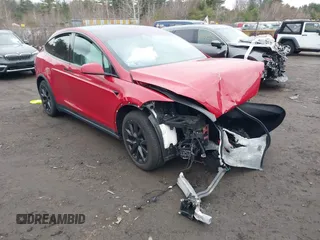2022 Tesla Model X with VIN 7SAXCBE57NF354843, listed as a IAAI auction lot 41027188 with Not Provided miles and . Bid and sale history available at DreamBid. Image 1.