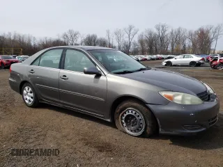 2004 Toyota Camry LE with VIN 4T1BE32K74U886385, listed as a Copart auction lot 51661485 with 175,973 mi miles and Salvage Title. Bid and sale history available at carsss.com. Image 4.