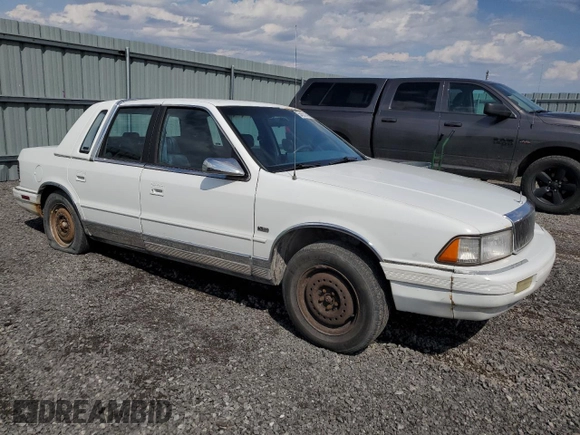 1992 Chrysler LeBaron z VIN 3C3XA5633NT336573, wystawiony jako Copart lot #54551495 z przebiegiem Nie podano mil oraz Tytuł czysty. Historia ofert i sprzedaży dostępna na DreamBid. Obrazek 4.