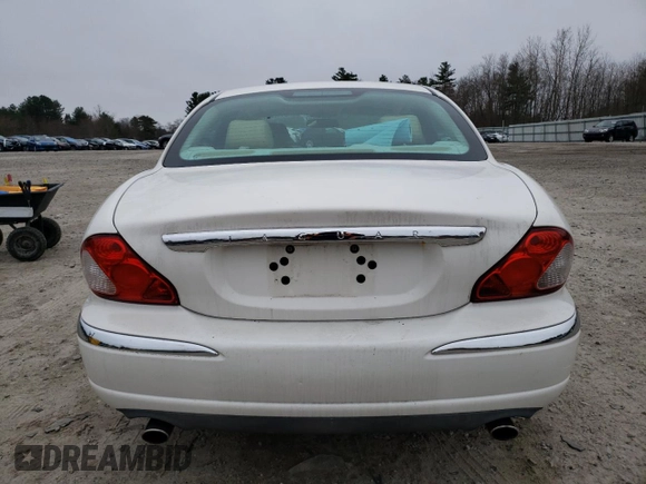 2005 Jaguar X-Type z VIN SAJWB52D95XE23602, wystawiony jako Copart lot #51172275 z przebiegiem 143 550 mil mil oraz Czysty tytuł • Clean title. Historia ofert i sprzedaży dostępna na DreamBid. Obrazek 6.