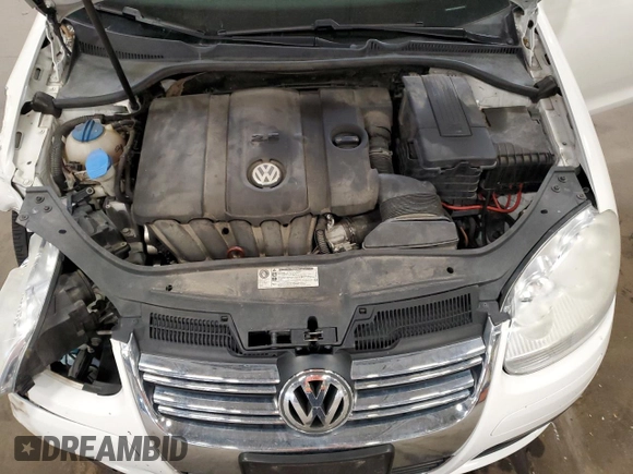 2010 Volkswagen Jetta S with VIN 3VWJZ7AJ5AM004163, listed as a Copart auction lot 54312695 with 148,160 mi miles and Salvage title. Bid and sale history available at DreamBid. Image 11.