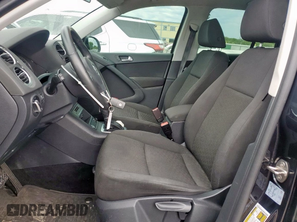 2017 Volkswagen Tiguan S with VIN WVGAV7AX4HK045724, listed as a Copart auction lot 60621715 with 64,004 mi miles and Salvage title. Bid and sale history available at DreamBid. Image 7.
