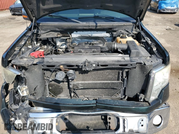 2012 Ford F-150 XL with VIN 1FTFW1EF1CKD27740, listed as a Copart auction lot 62552965 with 172,002 mi miles and Salvage title. Bid and sale history available at DreamBid. Image 11.