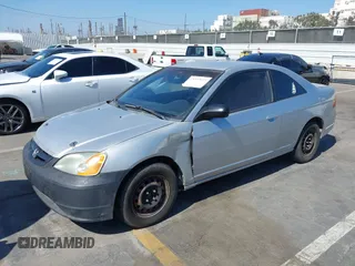 2003 Honda Civic LX with VIN 1HGEM22563L085882, listed as a IAAI auction lot 42227001 with 202,724 mi miles and . Bid and sale history available at DreamBid. Image 2.