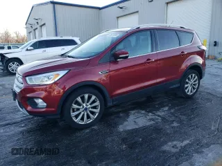 2017 Ford Escape Titanium with VIN 1FMCU0JD7HUD41107, listed as a Copart auction lot 85657084 with 197,982 mi miles and Salvage Title. Bid and sale history available at DreamBid. Image 1.