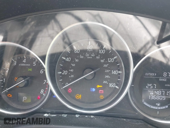 2016 Mazda CX-5 Sport with VIN JM3KE2BY4G0807776, listed as a IAAI auction lot 42206641 with 136,809 mi miles and . Bid and sale history available at DreamBid. Image 7.
