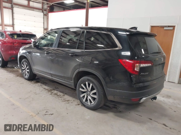 2019 Honda Pilot EX-L with VIN 5FNYF6H5XKB067858, listed as a IAAI auction lot 41643807 with 102,114 mi miles and . Bid and sale history available at carsss.com. Image 3.