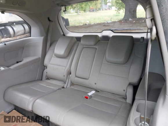 2012 Honda Odyssey Touring with VIN 5FNRL5H95CB101605, listed as a IAAI auction lot 42025163 with 286,421 mi miles. Bid and sale history available at carsss.com. Image 12.