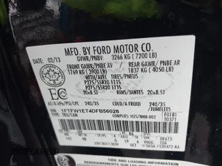 2013 Ford F-150 XL with VIN 1FTFW1ET4DFB56028, listed as a IAAI auction lot 40937403 with 303,294 mi miles. Bid and sale history available at carsss.com. Image 9.