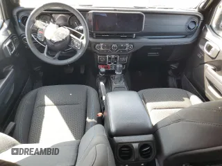 2024 Jeep Wrangler Rubicon z VIN 1C4RJXR6XRW291900, wystawiony jako Copart lot #61682885 z przebiegiem Nie podano mil oraz Szkoda całkowita • Salvage title. Historia ofert i sprzedaży dostępna na DreamBid. Obrazek 8.