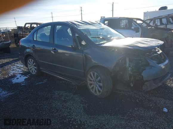 2010 Suzuki SX4 with VIN JS2YC5A40A6300053, listed as a IAAI auction lot 41392061 with 114,863 mi miles and . Bid and sale history available at DreamBid. Image 1.