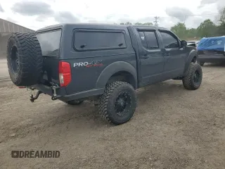 2012 Nissan Frontier Pro-4X with VIN 1N6AD0EVXCC415470, listed as a Copart auction lot 50650915 with 157,160 mi miles and Salvage title. Bid and sale history available at DreamBid. Image 3.
